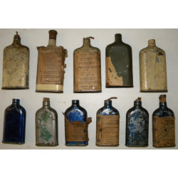 Collection de 11 bouteilles à poudre de chasse anciennes