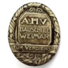 Insigne d'honneur pour le temps de service de l'A.H.V. Bauschule de Weimar - Abzeichen en argent