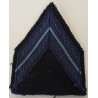 Grade de bras de Brigadier Appelé du Contingent à coudre